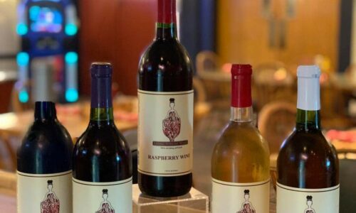 5 bottles of wine on display 